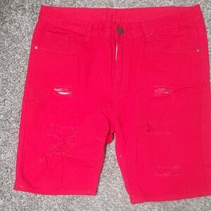 Red distressed jean shorts
